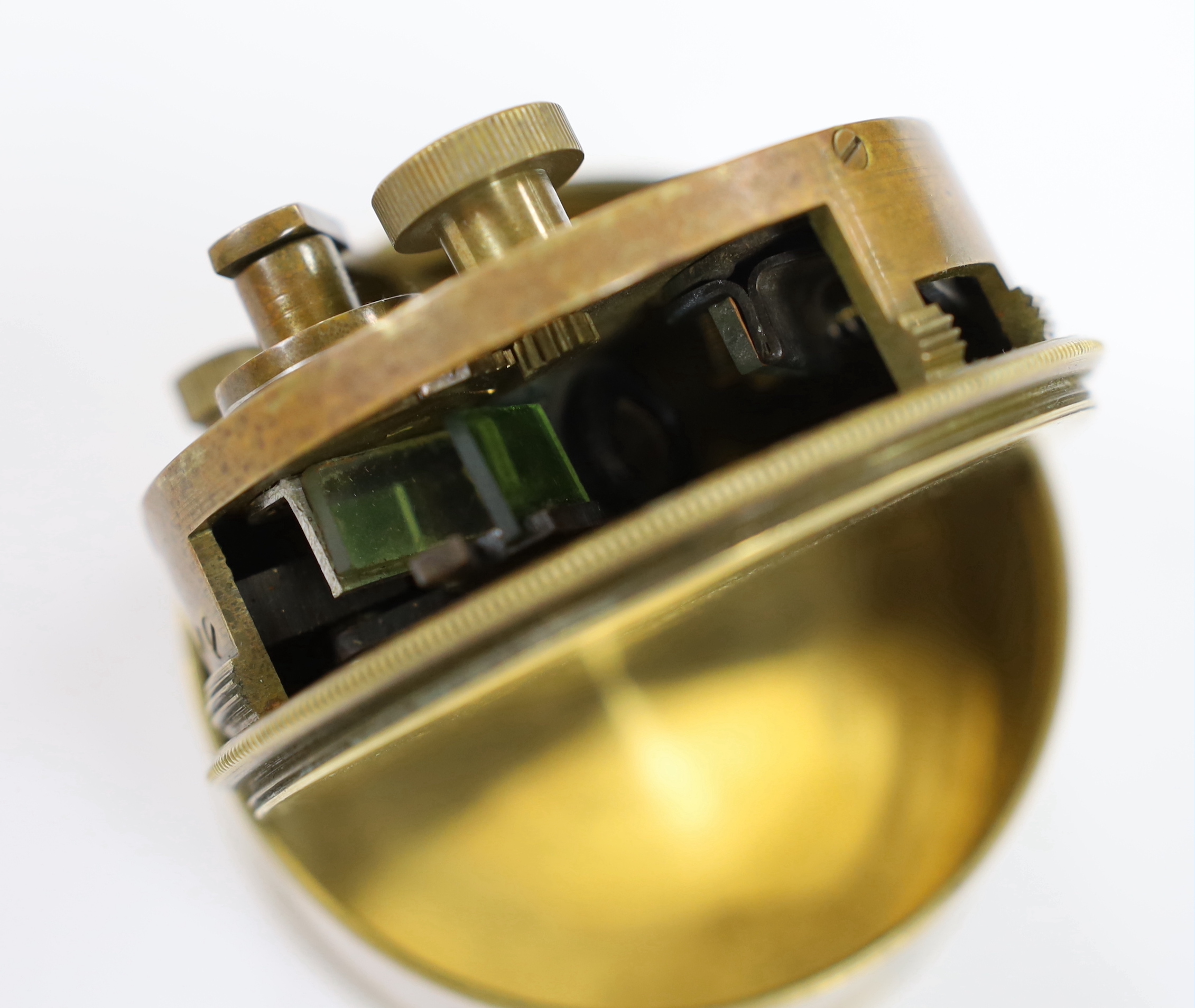 A 19th century Sestrel pocket brass cased sextant, diameter 7.7cm